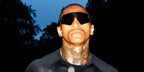 Conor Benn was seen wearing black Oakley Sutro Lite Sweep OO9465 03 Prizm sunglasses in a campaign shoot for Everlast