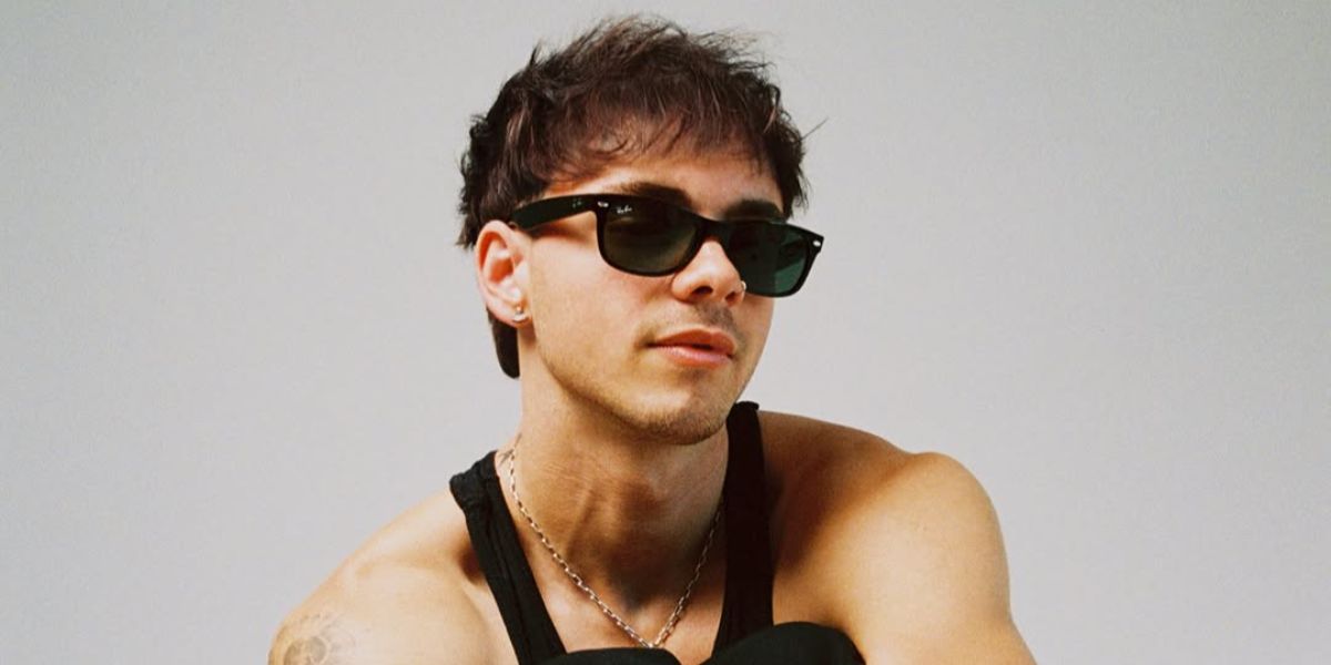 Singer Corbyn Besson was seen wearing black Ray-Ban New Wayfarer RB 2132 901 sunglasses in his Instagram post, October 2025.