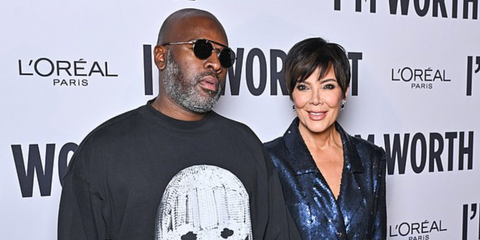 Corey Gamble, pictured with Kris Jenner, was seen weaing silver Dolce&Gabbana DG2295 05/87 round aviator sunglasses to attend the 6th L'Oreal Defile - Walk Your Worth during Paris Fashion Week Spring/Summer 2024