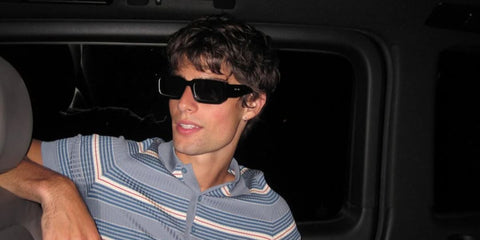 Italian internet personality Corrado Martini was seen wearing black and white Prada PR 06YS 09Q5S0 sunglasses at the Sound of Prada event in Berlin, June 2025.