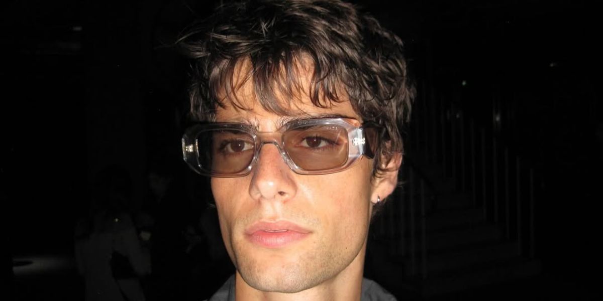 Italian model and internet personality Corrado Martini was seen wearing transparent Prada PR 17WS 19X30N sunglasses at the Sound of Prada event in Berlin, June 2025.