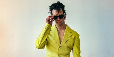 Cory Michael Smith was seen wearing Saint Laurent SL 732 Vadim 001 square sunglasses in a fashion editorial page of Numero Netherlands