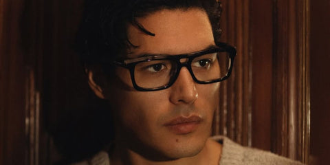 Italian actor Cristiano Caccamo was seen wearing black and grey Dolce&Gabbana DG3431 3403 optical glasses in his Instagram post, December 2025.