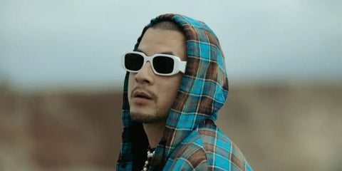 American-Thai rapper DABOYWAY was seen wearing white Prada PR 17WS 1425S0 Symbole sunglasses in his Intagram post, August 2022.