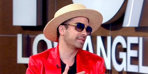 DJ Cassidy was seen wearing black and gold Balmain Officier BPS-108A sunglasses in an interview with Good Day LA promoting Pass The Mic Live in February 2026.