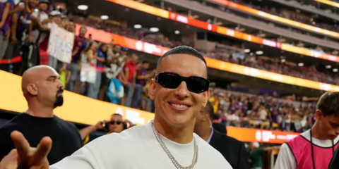 Daddy Yankee was seen wearing black Versace 4361 5360/87 biggie sunglasses to attend the pre-season friendly match between Arsenal and Barcelona in California