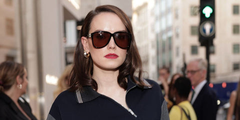 Daisy Ridley was seen wearing black Miu Miu MU A08S 16K90Q sunglasses with brown lenses at the reopening of Miu Miu New Bond Street Flagship Store in London, June 2025. Shop online now on Pretavoir