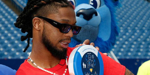 Damar Hamlin was seen wearing Prada PR 06YS 16K2K1 rectangular sunglasses as he launched CPR Tour to raise awareness at Bills stadium