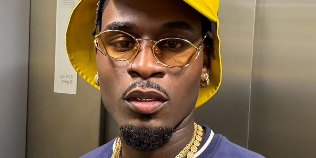 Television personality Dami Hope of Love Island (2022) was seen wearing gold Miu Miu MU 52YS ZVN10R sunglasses with yellow lenses in his Instagram post.