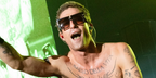 Damiano David was seen wearing black Balmain B Grand BPS-144A sunglasses with grey gradient lenses in a Maneskin concert
