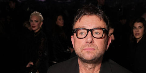 Musician Damon Albarn was seen wearing dark tortoiseshell Ray-Ban Wayfarer Ease RB 4340V 2012 optical glasses at the Christian Dior Haute Couture Spring/Summer 2026 fashion show during Paris Couture Week.