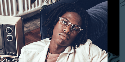 Canadian singer Daniel Caesar was seen wearing transparent Ray-Ban Clubmaster Optical RB 5154 2001 glasses in a Hypebeast feature.