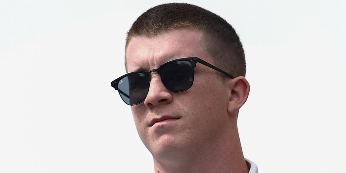 Racing driver Daniel Dye was seen wearing matte black Ray-Ban RB 3716 186/R5 sunglasses with blue lenses in his Instagram post, May 2025.