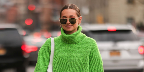 Fashion influencer Danielle Bernstein of the We Wore What blog was seen wearing gold Bottega Veneta BV1012S 004 aviator sunglasses with green lenses during New York Fashion Week. Shop online now on Pretavoir