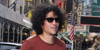 Danny Ramirez was seen wearing black Saint Laurent Sun SL 522 001 sunglasses with grey gradient lenses in New York City