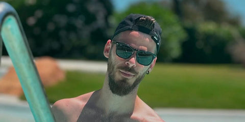 Spanish footballer David de Gea of Manchester United was seen wearing black Ray-Ban Steve RB 4487 6629/71 sunglasses in his Instagram post, June 2024.