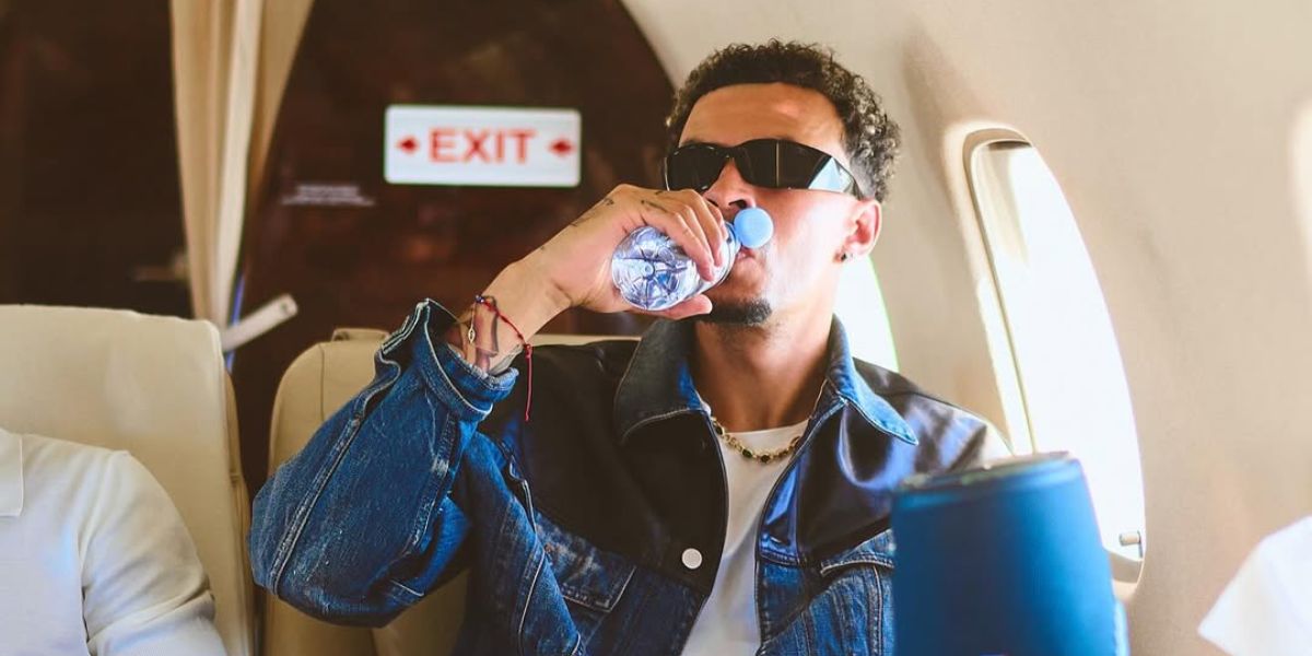 Footballer Dele Alli was seen wearing black Prada PR A19S 1AB5S0 wraparound sunglasses ahead of Milan Men's Fashion Week season Spring/Summer 2026. Shop online now on Pretavoir