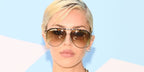 Model Delilah Belle Hamlin was seen wearing silver and tortoiseshell Isabel Marant IM 0139/S 8JD9Kaviator sunglasses with brown gradient lenses at the REVOLVE Festival 2024 in Palm Springs.
