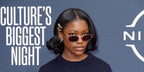 Demi Singleton was seen wearing brass gold Miu Miu MU 52YS 7OE01T oval sunglasses with brown lenses to attend the 2023 BET Awards
