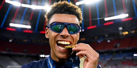 French footballer Desire Doue was seen wearing matte blue Nike Zeus Rise N IU4708X 492 sunglasses during Paris Saint-Germain’s victorious Champions League 2025 final.