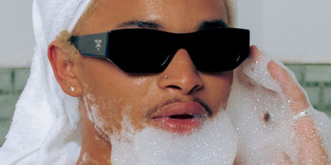 Singer Destin Conrad was seen wearing black Prada PR A01S 16K08Z sunglasses in a Gay Times feature, December 2024.