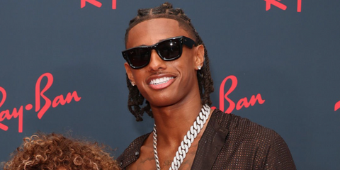 French basketball player Diamant Blazi was seen wearing black Ray-Ban Wayfarer Puffer RB 4940 601/87 sunglasses at the Sunday Night Set With Ray-Ban and "Paper Tiger" during the 79th annual Cannes Film Festival.
