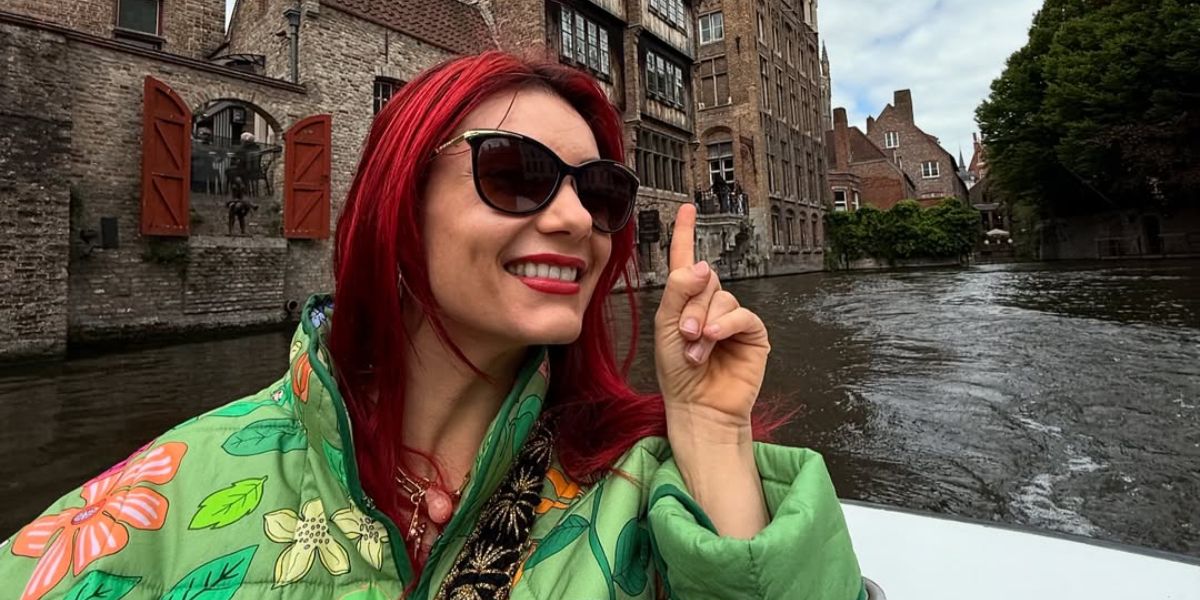 Australian dancer and television personality Dianne Buswell was seen wearing black and gold Ralph by Ralph Lauren RA5203 1090/13 sunglasses with brown gradient lenses during her holiday with partner Joe Sugg in Brugge, Belgium, in May 2025. Shop online now on Pretavoir