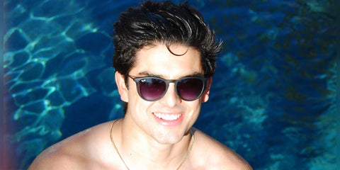 Diego Tinoco was seen wearing black rubber Ray-Ban Erika 4171 6228G round sunglasses with grey gradient lenses in his Twitter X post