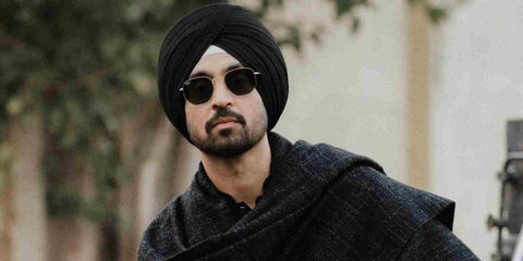 Diljit Dosanjh wears Ray-Ban RB 3548N 001 Hexagonal Gold With Flat Lenses sunglasses in Paris