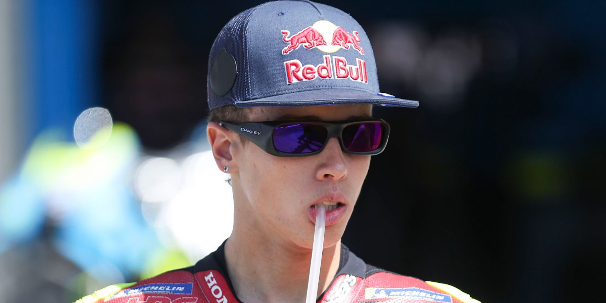Brazilian motorcycle racer Diogo Moreira was seen wearing matte black Oakley Permian OO9520 07 sunglasses with Prism road red mirror lenses at the MotoGP of France, April 2026.