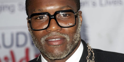 French footballer Djibril Cisse was seen wearing black Cazal Legends Mod 607 1 optical glasses at The Caudwell Children Butterfly Ball in London. Shop online now on Pretavoir