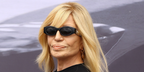 Donatella Versace was seen wearing black Versace 4480U GB1/87 sunglasses at the Jonathan Anderson debut for Dior Menswear Spring/Summer 2026 fashion show during Paris Men's Fashion Week