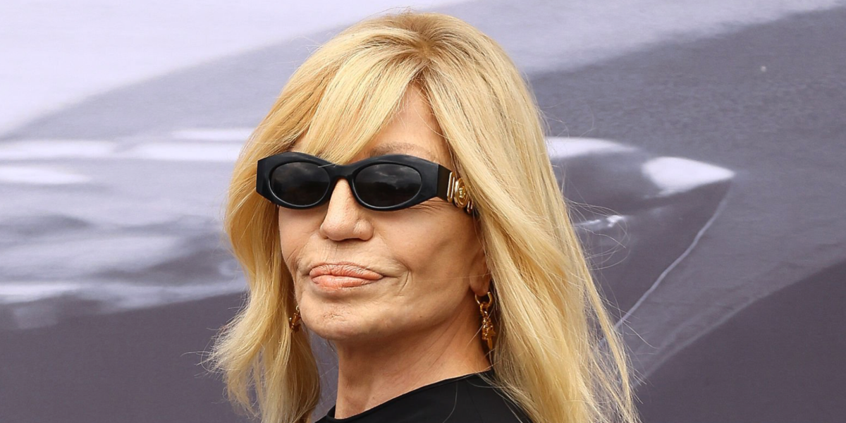 Donatella Versace was seen wearing black Versace 4480U GB1/87 sunglasses at the Jonathan Anderson debut for Dior Menswear Spring/Summer 2026 fashion show during Paris Men's Fashion Week