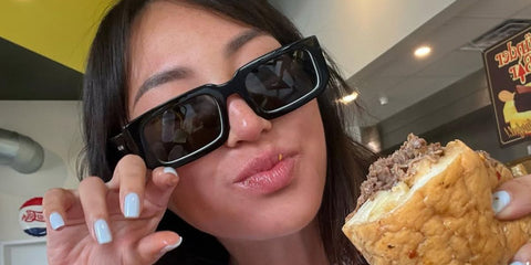 Dorothy Wang wears Prada PR 06YS 09Q5S0 sunglasses in her Instagram post