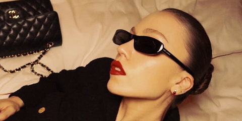 Turkish influencer and YouTuber Duygu Ozaslan was seen wearing black Saint Laurent Sun SL 557 Shade 001 sunglasses in her Instagram post, March 2026.