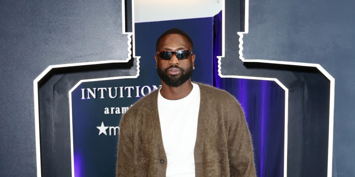 Dwyane Wade was seen wearing tortoiseshell Prada PR B11S 15W04D sunglasses with blue Polarised lenses at the launch of Intuition (Dwyane Wade collaboration with Aramis) at Macy's in Miami, Florida, October 2025.