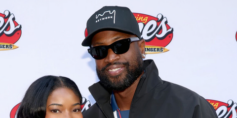 Dwyane Wade was seen wearing black Prada PR C09S 16K08G Polarised sunglasses at Raising Cane's Celebrity Party in Los Angeles, June 2026.