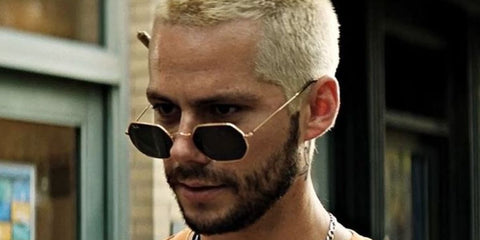 Dylan O'Brien was seen wearing gold Ray-Ban Octagonal RB 3556N 001 sunglasses in 2022 movie Not Okay
