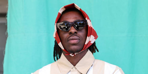 Footballer Eberechi Eze was seen wearing dark red check Burberry BE4425U 4115/87 cat eye sunglasses at the Burberry Spring/Summer 2025 fashion show during London Fashion Week. Shop online now on Pretavoir