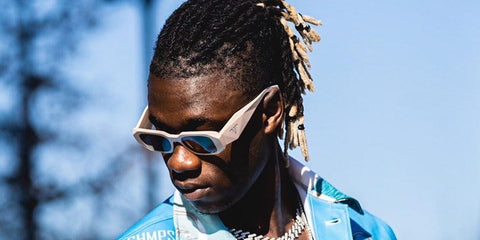Footballer Eduardo Cavaminga was seen wearing white Prada PR 17WS 1425S0 Symbole sunglasses.