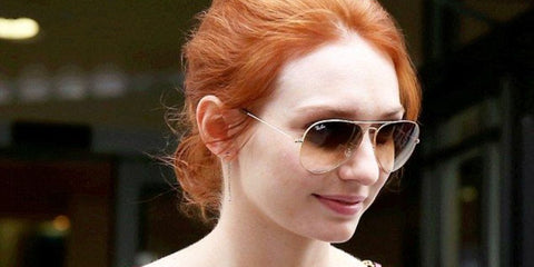 Celebrity actress Eleanor Tomlinson was seen wearing Ray-Ban Aviator 3025 001/51 Gold/Light Brown Gradient sunglasses