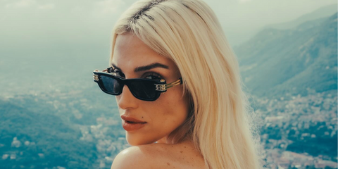 Venezuelan-American singer Elena Rose was seen wearing black and gold Bottega Veneta BV1308S 001 sunglasses 