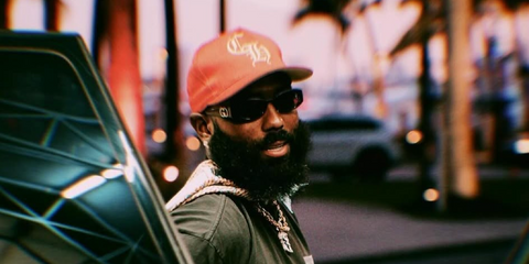 American football player Elijah Moore of the Cleveland Browns was seen wearing black Gucci GG1661S 001 sunglasses in his Instagram post, June 2024.