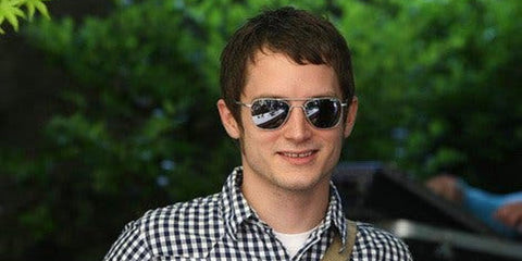 Actor Elijah Wood was seen wearing Randolph Aviator Matte Chrome AF085 sunglasses