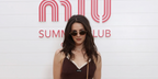 Ella Hunt was seen wearing gold Miu Miu MU 56ZS 5AK09Z sunglasses with brown lenses at the Miu Miu Summer Club during Cannes Film Festival 2024