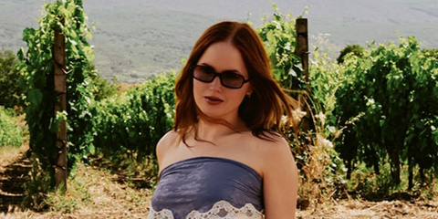 Actress Ellie Bamber was seen wearing black Chloe CH0363S 001 rectangular sunglasses with red gradient lenses at the Net-A-Porter x Chloé weekend getaway in Taormina, Sicily, June 2026