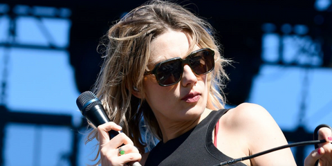 Lead singer of award winning band Wolf Alice, Ellie Rowsell, was seen wearing Cutler and Gross Sun 1397 02 Havana sunglasses onstage at the When We Were Young Festival 2022 in Las Vegas