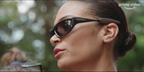Italian singer Elodie was seen wearing black and grey Bottega Veneta BV1184S 001 sunglasses in the trailer of Sento Ancora la Vertigine on Prime Video