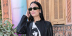 Italian singer Elodie was seen wearing crystal green Prada PR 17WS 11R10E sunglasses to attend the 2025 Sanremo Music Festival