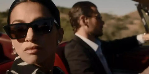 Elodie Yung was seen wearing black Saint Laurent Sun SL 276 Mica 001 cat eye sunglasses in The Cleaning Lady season 2, as Thony